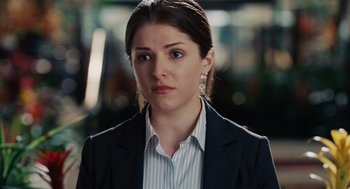 Movie still from “Up in the Air” (2009), directed by Jason Reitman – A person wearing a suit and tie; Close Up shot, Over the shoulder angle