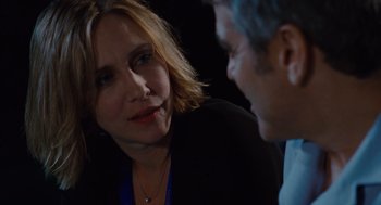 Movie still from “Up in the Air” (2009), directed by Jason Reitman – A woman and a man talking to each other; Close Up shot, Over the shoulder angle
