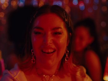 Movie still from “I M U R - Case of You” (2021), directed by Sebastian Hill-Esbrand – Close Up shot, Low angle
