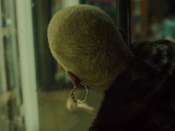 Movie still from “I M U R - Case of You” (2021), directed by Sebastian Hill-Esbrand – Extreme Close Up shot, High angle