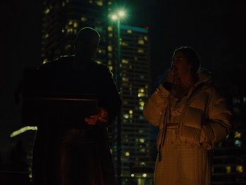 Movie still from “I M U R - Case of You” (2021), directed by Sebastian Hill-Esbrand – Medium shot, High angle
