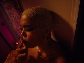 Movie still from “I M U R - Case of You” (2021), directed by Sebastian Hill-Esbrand – Close Up shot, High angle