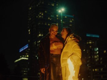 Movie still from “I M U R - Case of You” (2021), directed by Sebastian Hill-Esbrand – Medium shot, High angle