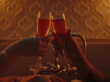 Movie still from “I M U R - Case of You” (2021), directed by Sebastian Hill-Esbrand – Extreme Close Up shot, Overhead angle