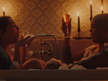 Movie still from “I M U R - Case of You” (2021), directed by Sebastian Hill-Esbrand – Medium shot, Overhead angle