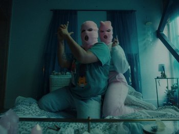 Movie still from “I M U R - Case of You” (2021), directed by Sebastian Hill-Esbrand – Medium shot, Low angle