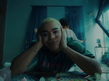 Movie still from “I M U R - Case of You” (2021), directed by Sebastian Hill-Esbrand – Medium shot, High angle