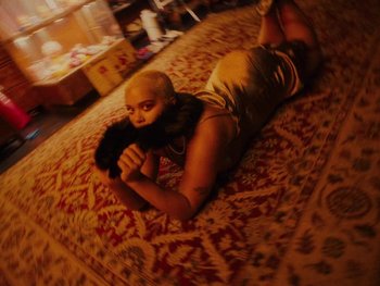 Movie still from “I M U R - Case of You” (2021), directed by Sebastian Hill-Esbrand – Medium shot, High angle