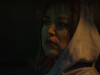 Movie still from “I M U R - Case of You” (2021), directed by Sebastian Hill-Esbrand – Close Up shot, Low angle