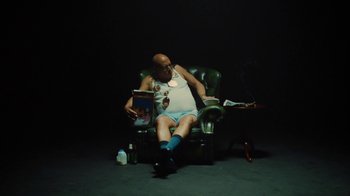 Movie still from “Rag’n’Bone Man - All You Ever Wanted” (2021), directed by Will Hooper – Medium shot, Low angle