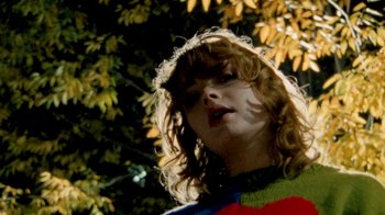 Movie still from “Mallory Merk - Strangers” (2021), directed by Kevin Lombardo – Close Up shot, Low angle