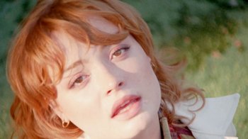 Movie still from “Mallory Merk - Strangers” (2021), directed by Kevin Lombardo – Extreme Close Up shot, High angle