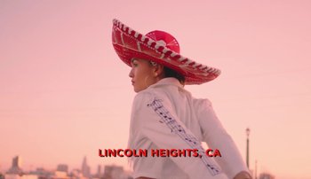 Movie still from “Rudy De Anda - Helado” (2020), directed by Adam Neustadter – Medium shot, Low angle