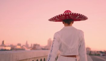 Movie still from “Rudy De Anda - Helado” (2020), directed by Adam Neustadter – Medium shot, Low angle