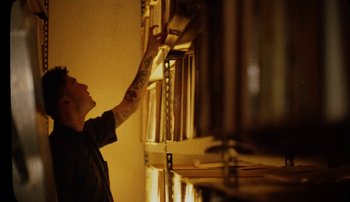 Movie still from “Rudy De Anda - Helado” (2020), directed by Adam Neustadter – Medium shot, Low angle