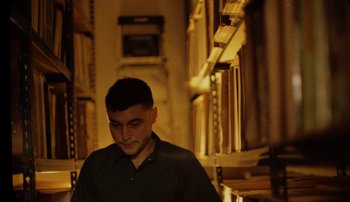 Movie still from “Rudy De Anda - Helado” (2020), directed by Adam Neustadter – Medium shot, Low angle