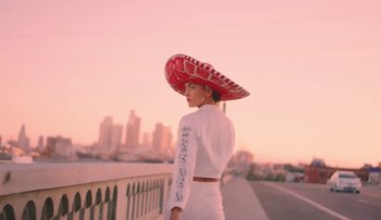 Movie still from “Rudy De Anda - Helado” (2020), directed by Adam Neustadter – Medium shot, Low angle