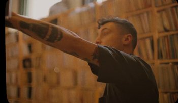 Movie still from “Rudy De Anda - Helado” (2020), directed by Adam Neustadter – Medium shot, Low angle