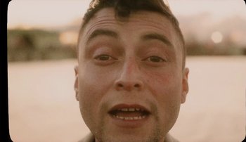 Movie still from “Rudy De Anda - Helado” (2020), directed by Adam Neustadter – Close Up shot, Low angle