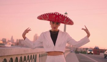 Movie still from “Rudy De Anda - Helado” (2020), directed by Adam Neustadter – Medium shot, Low angle