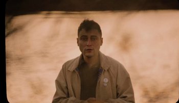 Movie still from “Rudy De Anda - Helado” (2020), directed by Adam Neustadter – Close Up shot, High angle