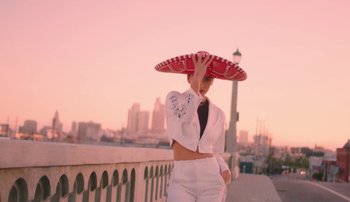 Movie still from “Rudy De Anda - Helado” (2020), directed by Adam Neustadter – Medium shot, Low angle
