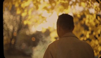 Movie still from “Rudy De Anda - Helado” (2020), directed by Adam Neustadter – Medium shot, Low angle