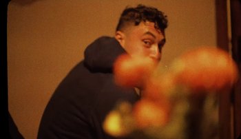 Movie still from “Rudy De Anda - Helado” (2020), directed by Adam Neustadter – Close Up shot, Low angle