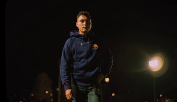 Movie still from “Rudy De Anda - Helado” (2020), directed by Adam Neustadter – Medium shot, Low angle