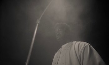 Movie still from “Nana - LA Times” (2020), directed by Andrew Litten – Medium shot, Low angle