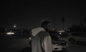 Movie still from “Nana - LA Times” (2020), directed by Andrew Litten – Medium shot, Over the shoulder angle