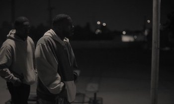 Movie still from “Nana - LA Times” (2020), directed by Andrew Litten – Medium shot, Low angle
