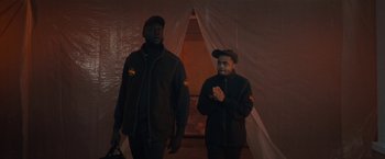 Movie still from “Loski & Stormzy - Flavour” (2020), directed by João Retorta – Medium shot, Low angle