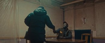 Movie still from “Loski & Stormzy - Flavour” (2020), directed by João Retorta – Medium shot, Over the shoulder angle