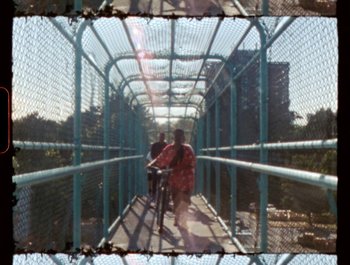 Movie still from “Flower Bomb - Come Together” (2020), directed by Benton Robertson – Extreme Wide shot, High angle
