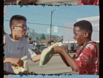 Movie still from “Flower Bomb - Come Together” (2020), directed by Benton Robertson – Medium shot, Low angle