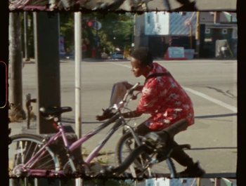 Movie still from “Flower Bomb - Come Together” (2020), directed by Benton Robertson – Wide shot, High angle