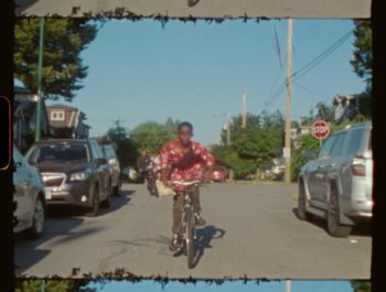 Movie still from “Flower Bomb - Come Together” (2020), directed by Benton Robertson – Wide shot, Low angle