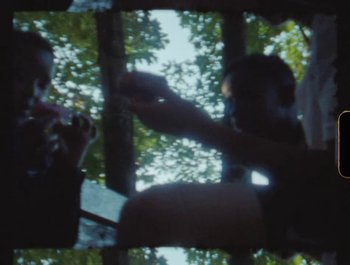 Movie still from “Flower Bomb - Come Together” (2020), directed by Benton Robertson – Extreme Close Up shot, High angle