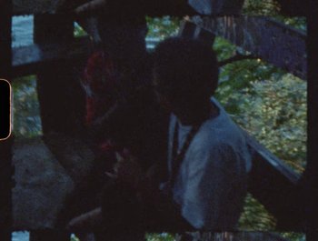 Movie still from “Flower Bomb - Come Together” (2020), directed by Benton Robertson – Extreme Close Up shot, Overhead angle