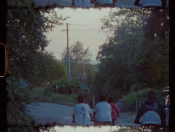 Movie still from “Flower Bomb - Come Together” (2020), directed by Benton Robertson – Extreme Wide shot, High angle