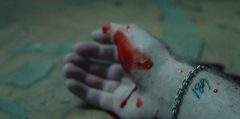 Movie still from “189 - Unfold” (2020), directed by Jonatan Egholm – Extreme Close Up shot, Overhead angle