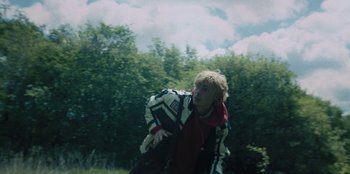 Movie still from “189 - Unfold” (2020), directed by Jonatan Egholm – Medium shot, Low angle