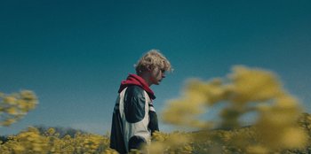 Movie still from “189 - Unfold” (2020), directed by Jonatan Egholm – Medium shot, Low angle