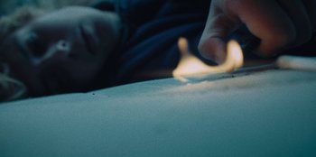 Movie still from “189 - Unfold” (2020), directed by Jonatan Egholm – Extreme Close Up shot, Overhead angle