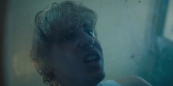 Movie still from “189 - Unfold” (2020), directed by Jonatan Egholm – Extreme Close Up shot, Low angle