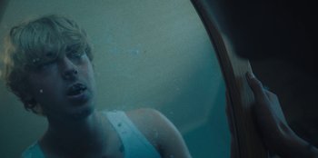 Movie still from “189 - Unfold” (2020), directed by Jonatan Egholm – Extreme Close Up shot, Over the shoulder angle