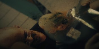 Movie still from “189 - Unfold” (2020), directed by Jonatan Egholm – Extreme Close Up shot, High angle