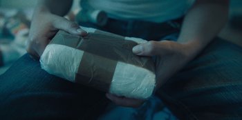 Movie still from “189 - Unfold” (2020), directed by Jonatan Egholm – Extreme Close Up shot, Overhead angle