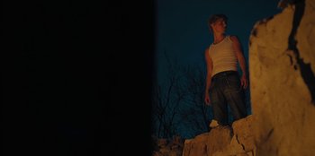 Movie still from “189 - Unfold” (2020), directed by Jonatan Egholm – Wide shot, Low angle